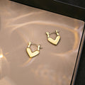 Elegant Gold Tone Alloy Hollow Heart Hoop For Women Minimalist Niche Design Daily Commuter Earrings view 1
