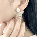 Elegant French Luxury Transparent Acrylic Butterfly White Flower Rhinestone Waterdrop Dangle Earrings view 3