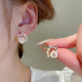 Light Luxury Floral Faux Pearl Stud Earrings With Rhinestone Hollow Flower Design view 1
