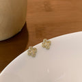 Copper Zircon Four Petal Flower Hollow Leaf Stud Earrings Minimalist Commuter Jewelry view 3