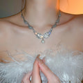 Luxury Faux Pearl Zircon Wing Necklace And Earrings Jewelry Set For Women view 4