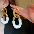 Alloy Oval Twisted Faux Leather Wrap Stud Earrings For Women Light Luxury Geometric Style view 2