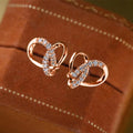 Light Luxury Wrapped Triangle Micro Pave Heart Stud Earrings, French Romantic Women Jewelry view 2