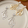 Elegant Pearl Stud Irregular Alloy Teardrop Fan Tassel Long Dangle Women's Luxury Statement Earrings view 1