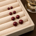 Elegant Red Faux Pearl Round Stud Earrings For Women, Minimalist Light Luxury Geometric Ball Earrings view 1