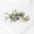 Alloy Butterfly Branch Lapel Pin For Suits Coats And Anti Exposure Brooch view 3