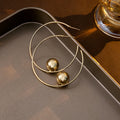 Light Luxury Geometric C Shaped Alloy Hoop Earrings With Round Pearl Ball Accent Elegant Statement Earrings view 2