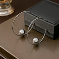 Light Luxury Geometric C Shaped Alloy Hoop Earrings With Round Pearl Ball Accent Elegant Statement Earrings view 3