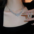 Light Luxury Alloy Rhinestone Teardrop U Shape Tassel Necklace And Drop Earrings Jewelry Set view 3