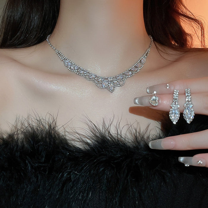 Light Luxury Alloy Rhinestone Teardrop U Shape Tassel Necklace And Drop Earrings Jewelry Set