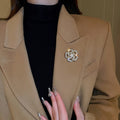 Gold Plated Copper Zircon Hollow Camellia Pearl Brooch For Women Creative Luxury Fashion Pin view 4