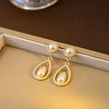 Vintage French Pearl Teardrop Dangle Earrings Luxury Alloy Rhinestone Hollow Water Drop Elegant Stud Earrings view 3