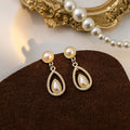 Vintage French Pearl Teardrop Dangle Earrings Luxury Alloy Rhinestone Hollow Water Drop Elegant Stud Earrings view 4