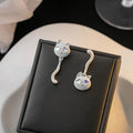 Elegant Asymmetric Cartoon Cat And Heart Drop Studs, White Enamel Alloy With Shell Crystal Accents Earrings view 3