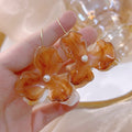 Vintage Hong Kong Style Gradient Amber Acrylic Flower Petal Pearl Dangle Women's Fashion Earrings view 4