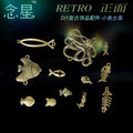 Antique Bronze Fish Alloy Charm Assortment in Twelve Designs view 2