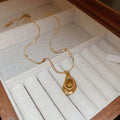 French Vintage Light Luxury Stainless Steel Faux Tiger Eye Teardrop Sweater Necklace view 2
