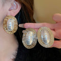 Vintage Geometric Oval Faux Pearl Stud Earrings With Wrinkled Striped Silver Needle Design view 4