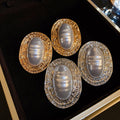 Vintage Geometric Oval Faux Pearl Stud Earrings With Wrinkled Striped Silver Needle Design view 3
