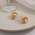 Vintage Gold Alloy Twisted Knot Hollow Cross Metal Stud Earrings For Women Elegant Statement Earrings view 3