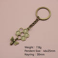Zinc Alloy Bee Honeycomb Keychain Bag Charm Gift – Antique Copper view 2