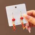 Elegant Ethnic Chinese New Year Red Enamel Lantern Firecracker Tassel Gold Tone Alloy Long Drop Earrings view 1