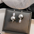 Elegant Silver Alloy Irregular Geometric Round Ball And Baroque Pearl Asymmetric Drop Stud Earrings view 1