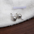 Elegant Silver Alloy Irregular Geometric Round Ball And Baroque Pearl Asymmetric Drop Stud Earrings view 4