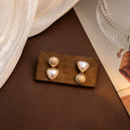 Elegant Geometric Round Oval Heart Faux Pearl Alloy Two-Way Stud Drop Women's Fashion Earrings view 2