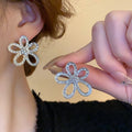 Alloy Silver Needle Rhinestone Hollow Flower Stud Earrings Chic Minimalist Luxury Style view 2