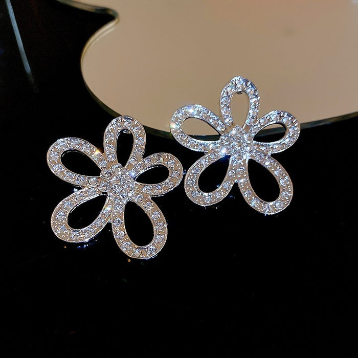 Alloy Silver Needle Rhinestone Hollow Flower Stud Earrings Chic Minimalist Luxury Style