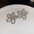 Alloy Silver Needle Rhinestone Hollow Flower Stud Earrings Chic Minimalist Luxury Style view 3