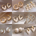 Alloy White Enamel Flower Geometric Heart Stud Earrings Korean Minimalist Sweet Fashion Jewelry view 1
