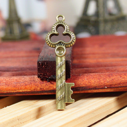 Vintage Key Charm Pendant with Three-Leaf Flower 52x17mm