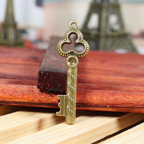 Vintage Key Charm Pendant with Three-Leaf Flower 52x17mm