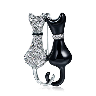 Front product view of the cat brooch pin in silver and black