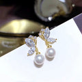 Akoya Style Butterfly Bow Pearl Stud Earrings, Round Faux Pearl Chic Earrings For Women view 4