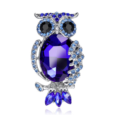 Front product view of the owl brooch pin in blue and silver