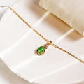 Light Luxury Emerald Green Water Drop Pendant Necklace With Hollow Rhinestone Vintage Style view 3