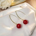 Elegant Gold Alloy Rhinestone Curved Ear Hook Threader Long Tassel Pearl And Red Bead Drop Earrings view 3