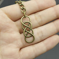 Metal Minimalist Double Eight Shape Keychain Bag Charm view 4