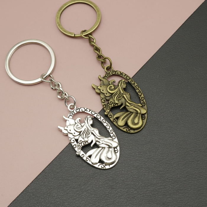 Zinc Alloy Simple Angel Keychain Bag Charm Gift (6457)