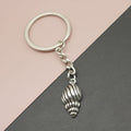 Zinc Alloy Simple Conch Shell Keychain Bag Charm Gift view 1