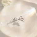 Elegant Korean Rhinestone Cream Swirl Cross Hollow Studs Silver Needle Commuter Versatile Earrings view 2
