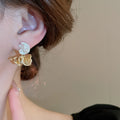 Alloy French Vintage Wrinkled Flower Pearl Stud Earrings For Women Light Luxury Jewelry view 3