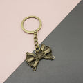 Zinc Alloy Simple Bow Keychain Bag Charm Gift view 1