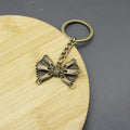 Zinc Alloy Simple Bow Keychain Bag Charm Gift view 3