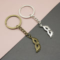 Metal Mask Keychain Minimalist Bag Charm Gift view 1
