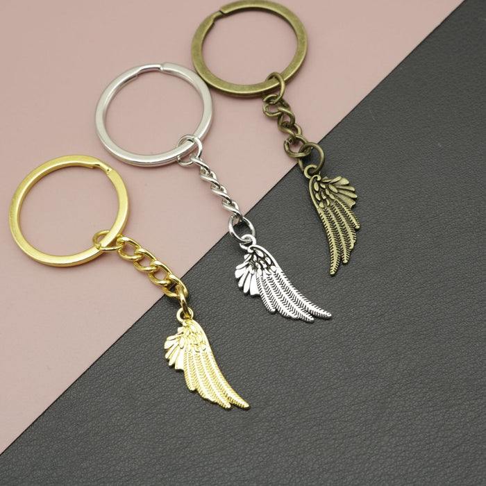Zinc Alloy Simple Wing Feather Keychain Bag Charm Gift