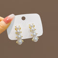 Silver Needle Korean Geometric Pearl Earrings Luxury Butterfly Flower Vintage Pearl Stud Earrings view 3